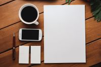 Kaboompics - White sheet of paper, a coffe and a smartphone on a table