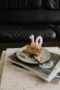 Kaboompics - Top View of Cake Slice and Number Candle
