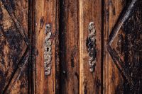 Kaboompics - Close-Up Dark Wood Furniture Panels and Metal Handles