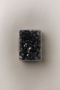 Kaboompics - Black Thumbtacks in Clear Box