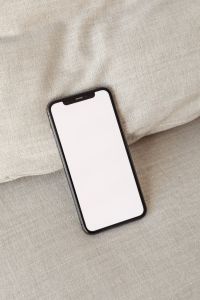 Kaboompics - Large Angled Smartphone Screen Mockup on Beige Fabric