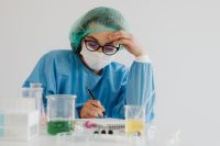 Kaboompics - Lab Researcher Reviewing Notes During Experiment