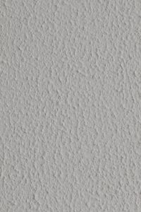 Kaboompics - Raised Bumps in a White Paint Texture Macro