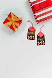 Kaboompics - Vertical Christmas Gift Flat Lay with Tags and Copy Space