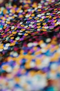 Kaboompics - Rainbow Sequin Fabric with Diagonal Folds and Shallow Focus, Fashion Background