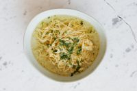 Kaboompics - Overhead Bowl of Traditional Polish Chicken Noodle Soup with Parsley