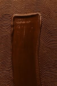 Kaboompics - Dark Foundation Swatch on Ridged Texture
