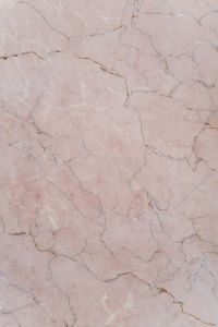 Kaboompics - Pale Pink Cracked Plaster Wall Texture