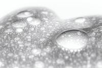Kaboompics - Large Clear Bubble in Shallow Focus over Dense White Cosmetic Foam, Horizontal Skincare Texture Background for Beauty and Product Design