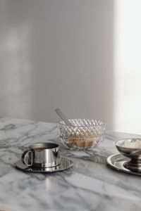 Kaboompics - Chrome Coffee Cups and Reflective Metal Vessels on Arabescato Marble