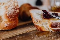 Kaboompics - Powdered Challah Slices With Raspberry Jam and Spoon