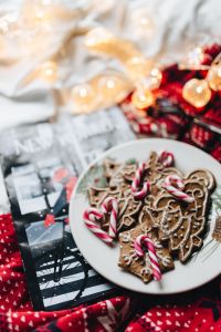 Kaboompics - Red Holiday Mug and Gingerbread Cookies in Warm Christmas Light