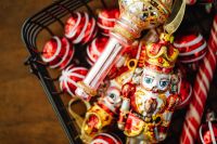 Kaboompics - Red Nutcracker Ornaments in a Wire Basket
