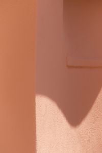 Kaboompics - Geometric Shadow on Pink Terracotta Wall Corner, Italy