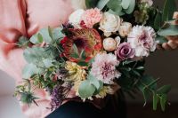 Kaboompics - Close-Up of Mixed Flower Bouquet with Roses and Eucalyptus