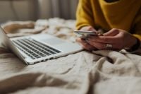 Kaboompics - Laptop and Smartphone on White Bedding During a Work From Bed Session
