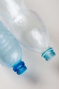 Kaboompics - Close-Up of Water-Dappled Plastic Bottle Openings