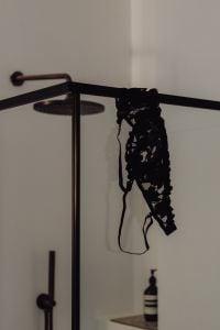 Kaboompics - Black Lace Bra in a Shower Setting