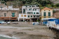 Kaboompics - Seaside Houses and Blue Beach Club Along Marina di Puolo Harbor, Italy