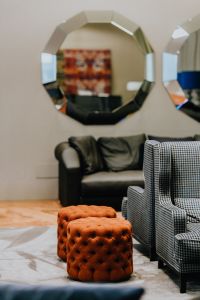 Kaboompics - Orange poufs and big mirror