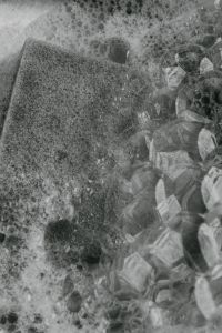 Kaboompics - Black and White Sponge With Soap Bubbles