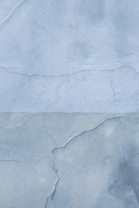 Kaboompics - Pale Blue Wall with Layered Cracks