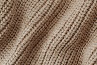 Kaboompics - Cream Beige Ribbed Knit Texture