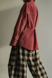 Kaboompics - Model in Red Striped Shirt and Gingham Pants