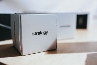 Kaboompics - Little paper boxes with words on them