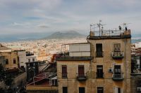 Kaboompics - Weathered Naples Apartment Rooftops With Mount Vesuvius Beyond