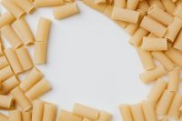 Kaboompics - Rigatoni Border Around White Copy Space, Horizontal Italian Menu Background