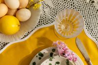 Kaboompics - Crystal Goblet and Lemon on Mustard Yellow Easter Table Setting