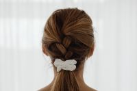Kaboompics - Long French Braid with White Scrunchie