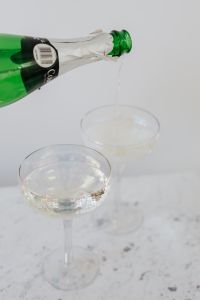 Kaboompics - Action Shot of Champagne Being Poured Into Glasses