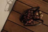 Kaboompics - Overhead Red Grapes in Woven Basket