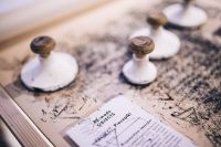 Kaboompics - Big wooden stamps on a dirty table