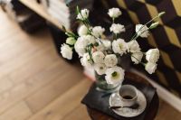 Kaboompics - Flowers and cup of coffee