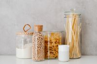Kaboompics - Glass Food Storage Jars with Chickpeas, Farfalle, Spaghetti and Wheat Flour