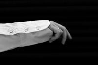 Kaboompics - Elegant Hand Gesture Against a Black Background