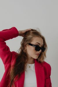 Kaboompics - Woman Smiling in a Pink Blazer Portrait