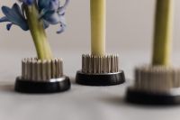Kaboompics - Three Kenzan Flower Frogs with Selective Focus and Floral Blur