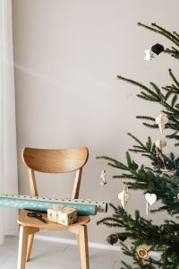 Kaboompics - Christmas Gift Wrapping Setup beside Tree