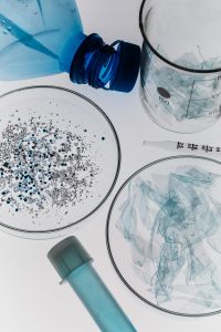 Kaboompics - Microplastics And Plastic Waste In Laboratory Glassware Top View