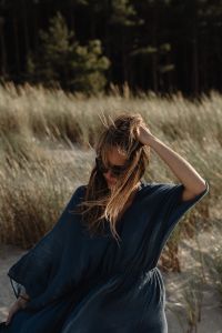 Kaboompics - Windblown Hair and Blue Kaftan Lifestyle Portrait