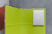 Kaboompics - Laptop and Lime Green Seating in a Contemporary Lounge