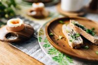 Kaboompics - Breakfast served with tea, bread and eggs