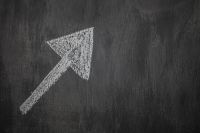 Kaboompics - White Chalk Arrow Pointing Up on a Black Blackboard, Business Growth and Direction Concept