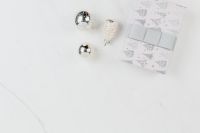 Kaboompics - Silver Christmas Baubles and Patterned Gift Box on Marble Background