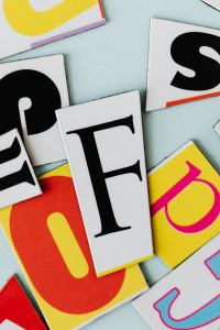 Kaboompics - Colorful Alphabet Letter Flat Lay on Pastel Blue