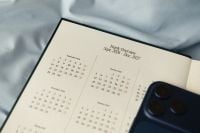 Kaboompics - 2027 Year Planner With Smartphone on Blue Bedding